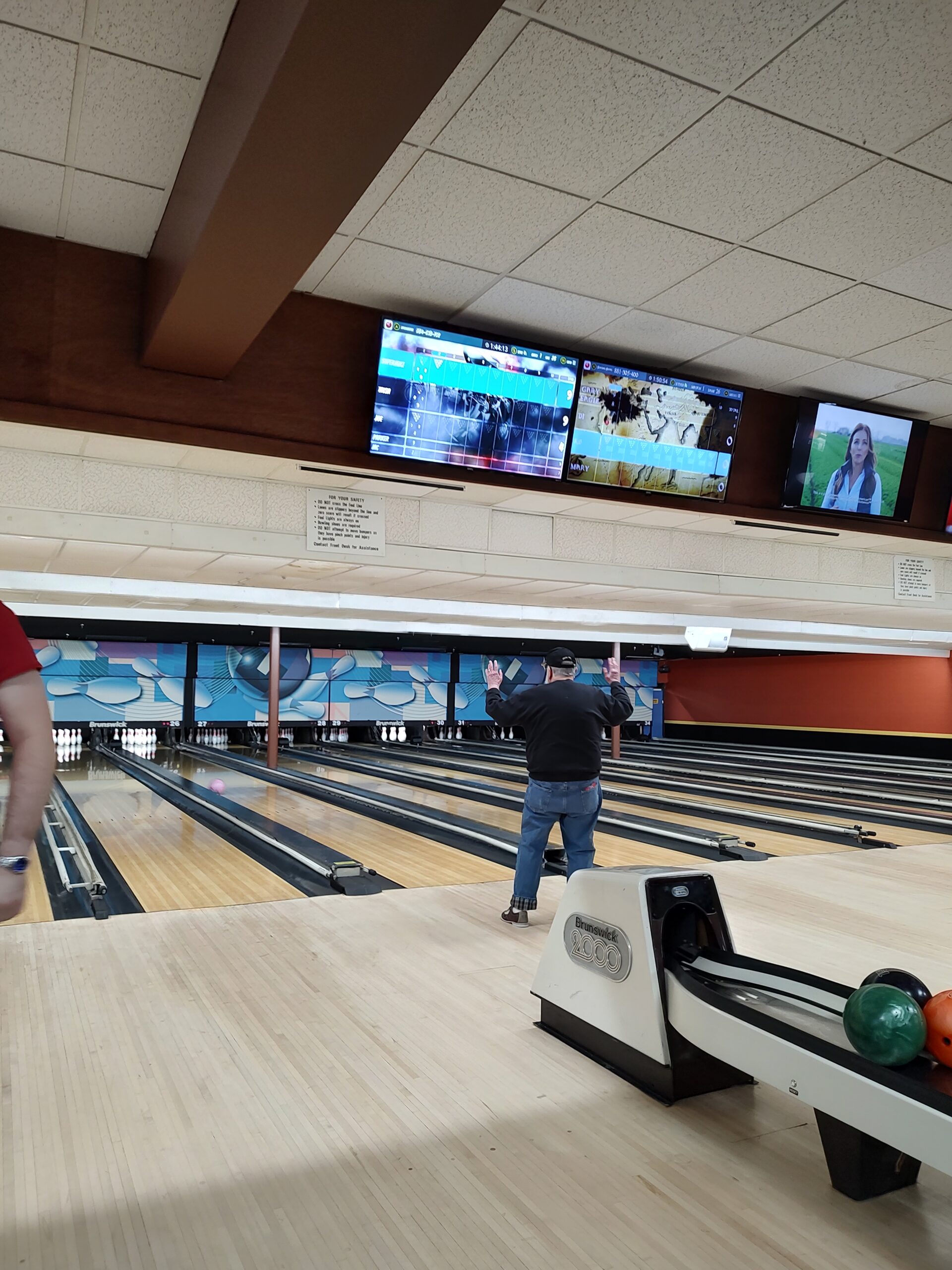 Kevin Brown struggles with a stuck gutter ball.